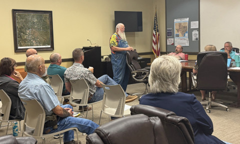 LOCAL FIRE DEPARTMENTS headed by volunteers such as McAdoo’s Mack Gardner (center), outlined successes—and needs—at Monday’s Dickens County Commission meeting. | THE TEXAS SPUR