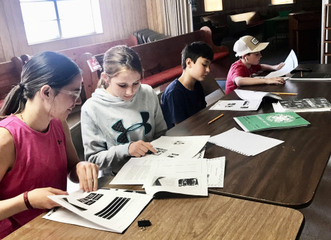 RECORD BOOK TIME Eight members of Dickens County 4-H met to learn record-keeping skills to complete their record books by July 9. | 4-H PHOTO