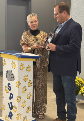 John Eric Swenson (right) was presented this annual honor by Marcella Bilberry during Saturday morning’s assembly. FULL STORY, NEXT WEEK | TEXAS SPUR