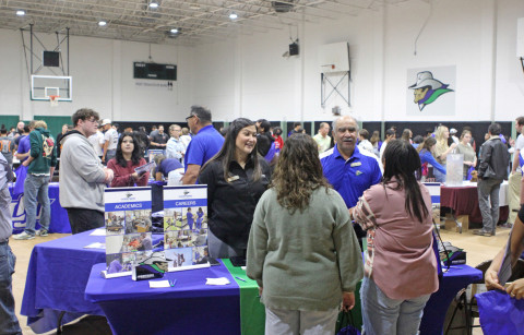 WESTERNTEXASCOLLEGE recruiters Isrell Lawson and Raúl Alcalá speak with prospective students at the 2024 College Fair. | COURTESY PHOTOS