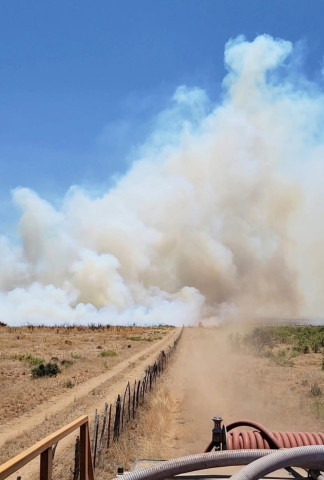 GRASS FIRE OUTSIDE SPUR