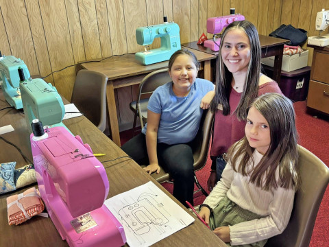 DICKENS 4-H Dickens 4-H held their first spring Pins and Needles meeting last week. Jeri Holcomb, local fashion ambassador, was on hand to teach sewing machine parts, and demonstrate how to sew straight lines; attendees made fabric Easter eggs. | COURTESY PHOTO