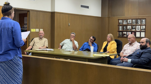 DATADECISIONS Competing concerns of property owners, citizens and business interests faced the Kent County commissioners court out of the blue this month, as a fast-moving AI data center industry turned its sights on a site in the northwest part of the county. Speaking before commission members (from left) County Judge Layne Coulter, Robert Graham, Ray Hall, Debbie Myers and Turney Coulter, with outside counsel Jake Lederle, was resident Amy Carr, who led a petition to protest the development. | TEXAS SPUR
