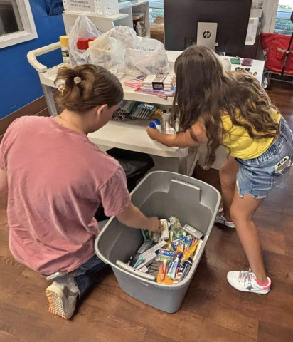 HELPING OUT First stop for the Dickens 4-H in Lubbock was the Ronald McDonald House to deliver toiletries and can tabs. | COURTESY PHOTO