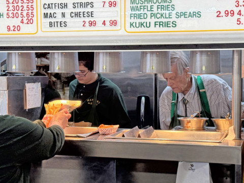 WOULD YOU LIKE SOME KUKU FRIES with that? Gene Waylan, above right, has owned and operated the last remaining restaurant in the former Ku-Ku chain for more than half a century.