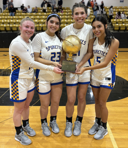 CELEBRATION Spurettes seniors celebrate their 63-20 bi-district win. From left are Erin McGalliard, Addison Fulmer, Kimberlee Segura and Olivia Ortiz. | TEXAS SPUR PHOTO