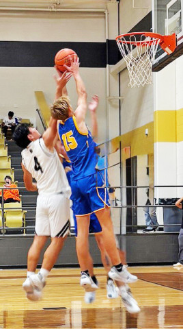 REBOUND Mattijs De Boer grabs a rebound in the Bulldogs’ season opener against Haskell