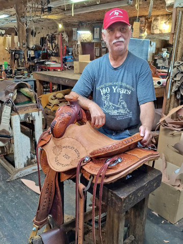 SADDLEMAKER Will Burgess has once again crafted a fine saddle that will go to theTop Hand to be announced Saturday night at the 102nd Motley-Dickens Old Settlers Reunion &amp; Rodeo at Roaring Springs. | COURTESY PHOTO
