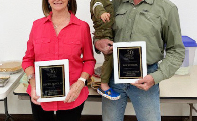 In Jayton last week, well wishers honored longtime county judge’s secretary Becky Arnold (left) and county commissioner Roy Chisum with a retirement party | COURTESY PHOTO