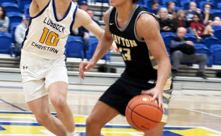 ON OFFENSE Jaybirds’ Sean Stanaland drives around a LCHS defender Feb. 20. | SUE JANE SULLIVAN FOR THE TEXAS SPUR