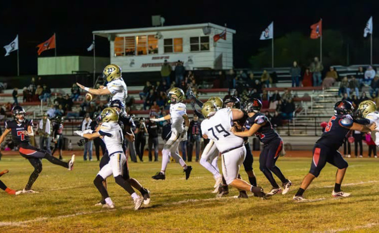 KICK BLOCK Jaybird sophomore Jack Wooley flew into action to block a Hornet’s kick during Friday night’s football game, delivering a key defensive play for the Jaybirds. | KEVIN MOODY
