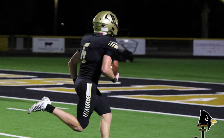 TOUCHDOWN Junior wide receiver Tucker Scott (6) heads to the end zone for a Jaybirds touchdown with his pass reception. | COURTESY PHOTO