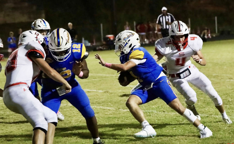 BULLDOGS BATTLE OWLS in the first District game of the year, at home. | COURTESY PHOTOS