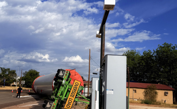 OVERSIZED LOAD OVERTURNS IN SPUR