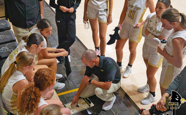 JAYTON GIRLS COURT ACTION In their second week of season play, Coach Kevin Chisum’s cagers added another with a 41-29 victory over Highland Nov. 11. | JGISD YEARBOOK PHOTOS