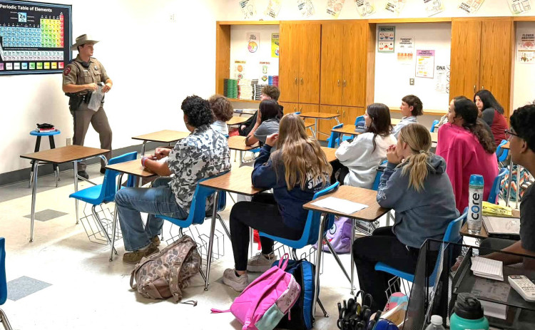 REAL-WORLD LESSONS Troopers from the Texas Department of Public Safety stopped by and talked to senior science students about evidence and provided some real world lessons last week at Spur High School. | COURTESY PHOTOS