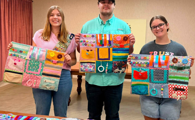 HELPING OTHERS Jessica Baldridge, a 2026 graduate of Jayton High School, has been making sensory mats with her girl scout team for the Kent County Nursing Home residents, for her Girl Scout Gold Award service project. She is currently finishing up final touches of making a website for more information to widen reach for awareness and education. | COURTESY PHOTOS