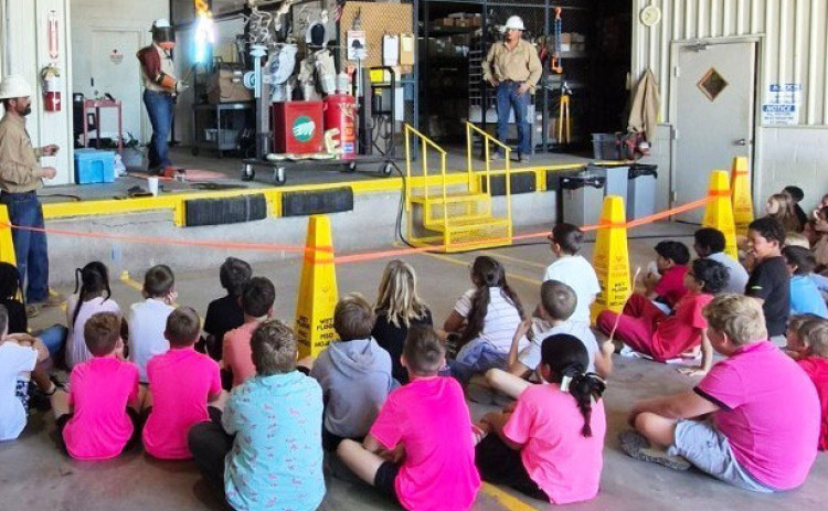South Plains Electric Cooperative hosted Jayton fourth graders last week in their Spur headquarters, teaching the children electrical safety education and providing live demonstrations of power line hazards and safety tips. | COURTESY PHOTO