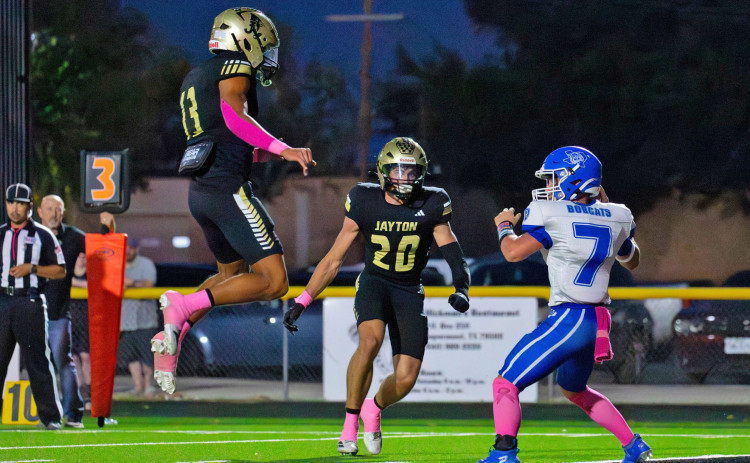 JUMPING ATTHE CHANCE to stop Rule were Sean Stanaland and Colt Gentry. | COURTESY PHOTO