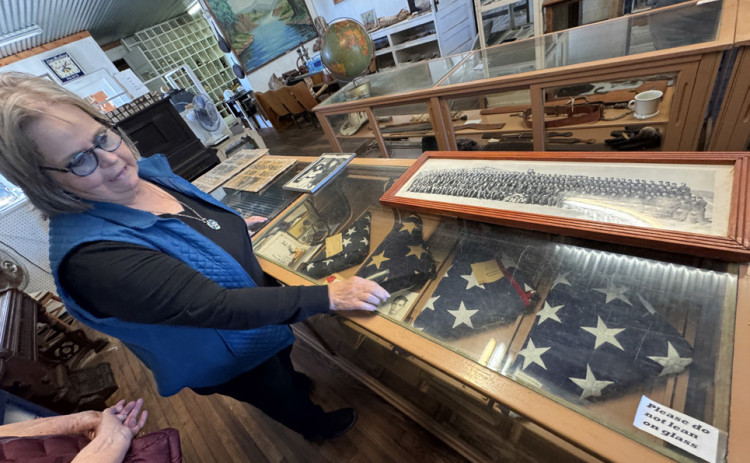 SOMEGAVEALL On Saturday afternoon’s tour, Dickens Museum curator Ruby Combs pointed out numerous exhibits that illustrate the valor and sacrifice by local members of the armed services, from a Civil War–era saber, to Armistice headlines in The Dickens Times and other local newspapers of 1918, to World War II uniforms and letters home. | THE TEXAS SPUR