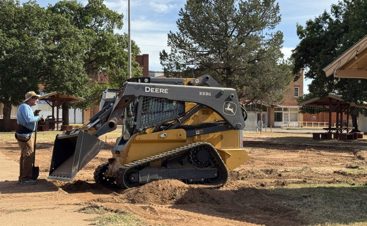 DIRTWORK Under the supervision of John Eric Swenson (left) and Tye Maben, landscaping improvements at Spur’s Rickels Park are beginning to take shape. | THE TEXAS SPUR