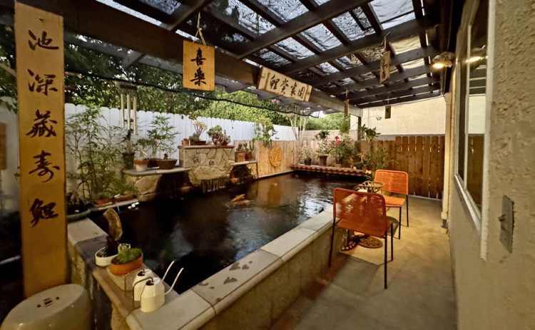 LODGING IN L.A. need not be extravagant; while the Beverly Hilton surely has its charms, we doubted we’d have enjoyed it more than this modest guesthouse with a luxurious koi pond and garden—and free parking.
