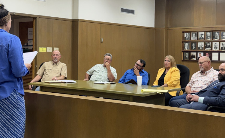 DATADECISIONS Competing concerns of property owners, citizens and business interests faced the Kent County commissioners court out of the blue this month, as a fast-moving AI data center industry turned its sights on a site in the northwest part of the county. Speaking before commission members (from left) County Judge Layne Coulter, Robert Graham, Ray Hall, Debbie Myers and Turney Coulter, with outside counsel Jake Lederle, was resident Amy Carr, who led a petition to protest the development. | TEXAS SPUR