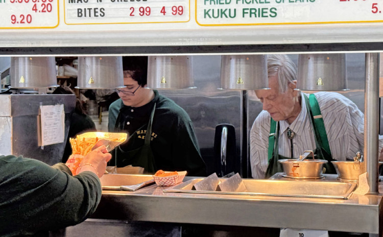 WOULD YOU LIKE SOME KUKU FRIES with that? Gene Waylan, above right, has owned and operated the last remaining restaurant in the former Ku-Ku chain for more than half a century.