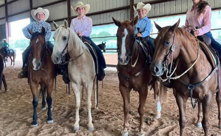 NOTJUSTHORSINGAROUND Dickens 4-H members Rylee Foster, Maddee Foster, Steeley Smith and Paisley Smith competed in numerous events at the District 3 4-H Horse show in Vernon last week. | COURTESY PHOTOS